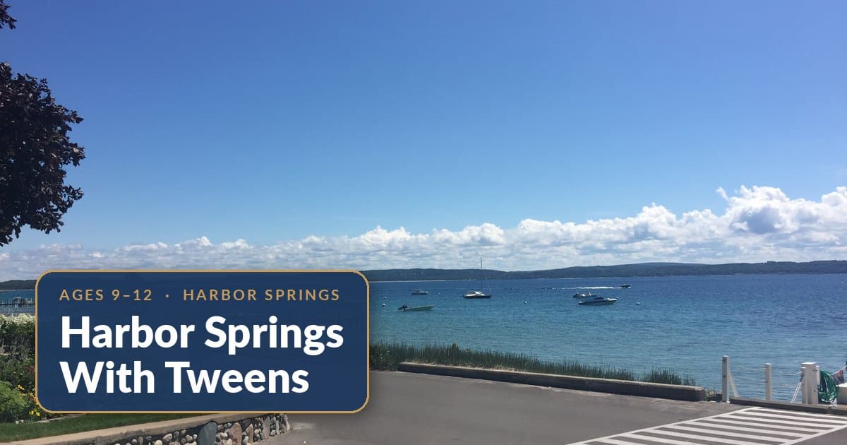 Turquoise Little Traverse Bay with boats near Harbor Springs — a home base for a family trip with tweens at The Bird House